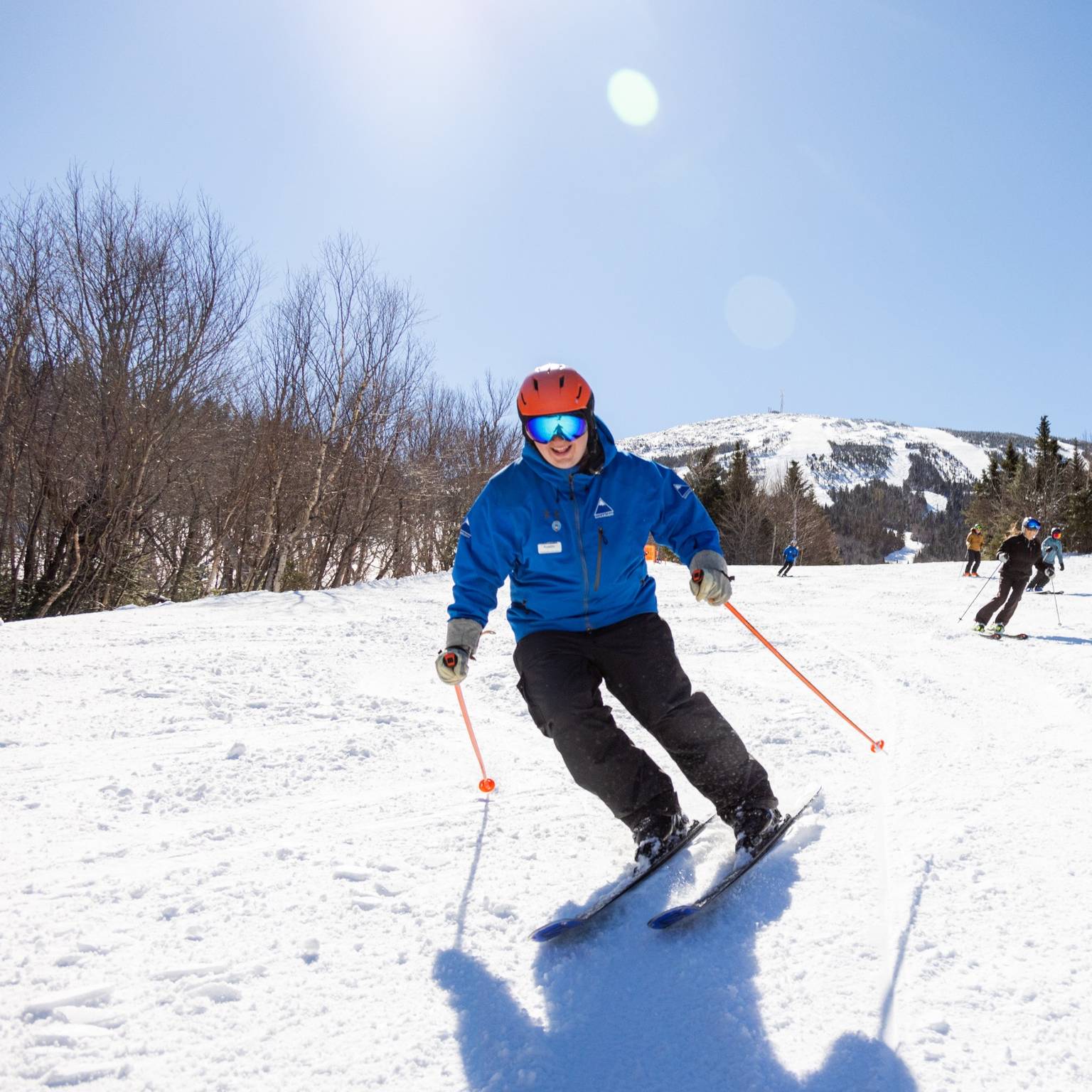 Ski instructor smiling at camera