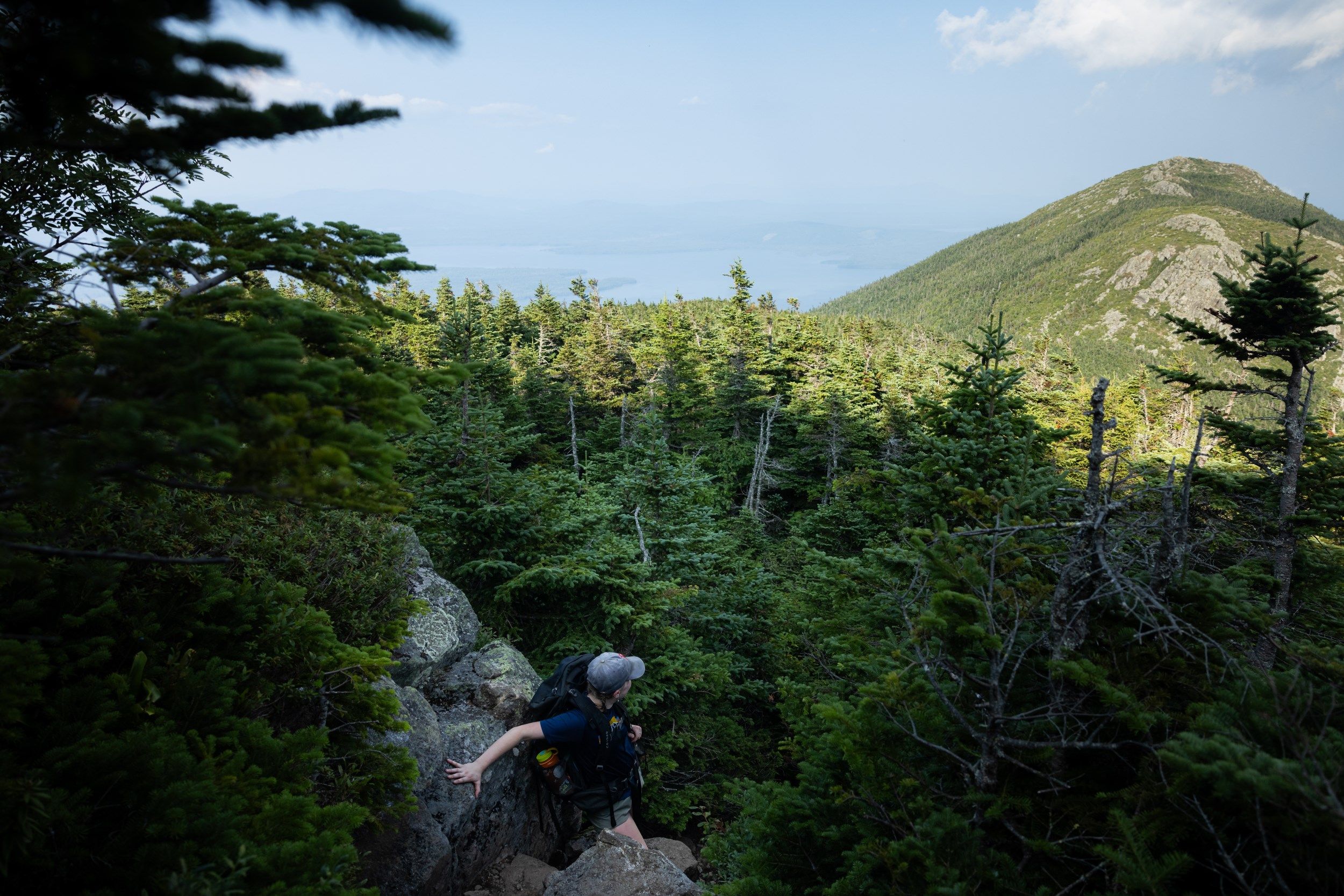 Hiker admiring mountain range