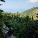 Hiker admiring mountain range