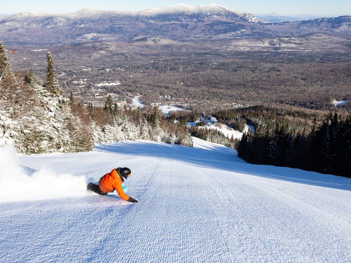 Snowboarder on slopes