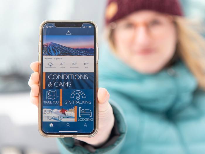 Woman holding cell phone