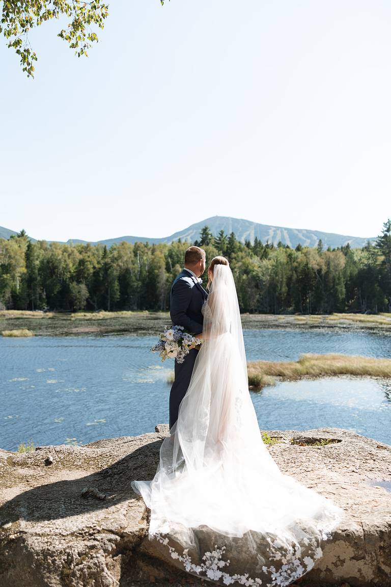 Bride and groom on bridal rock