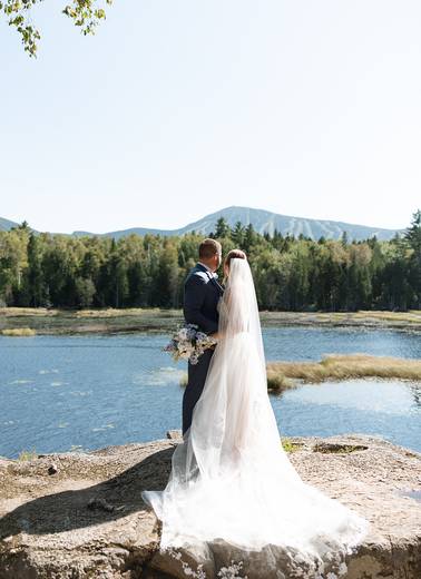 Bride and groom on bridal rock