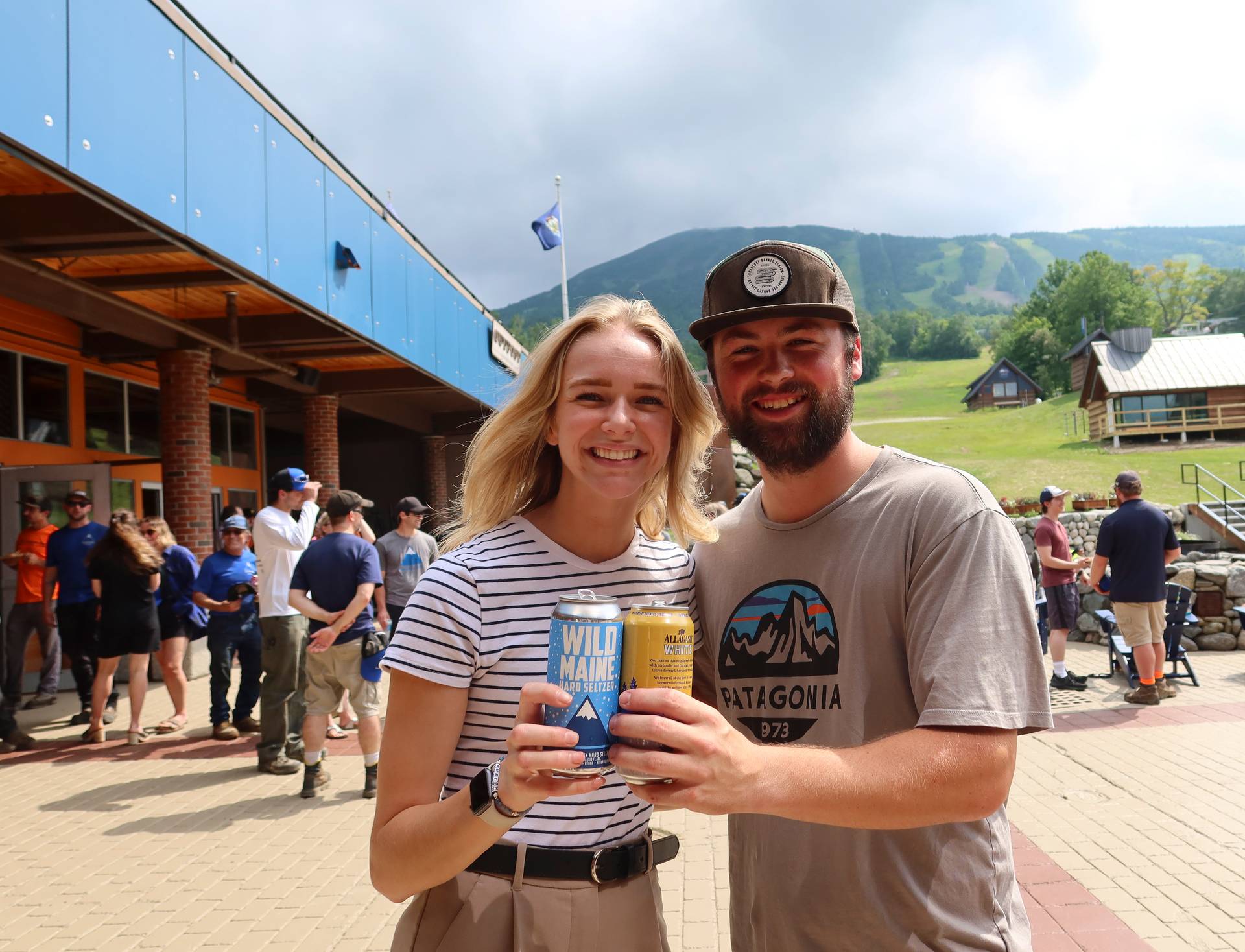 Couple with beers on The Beach