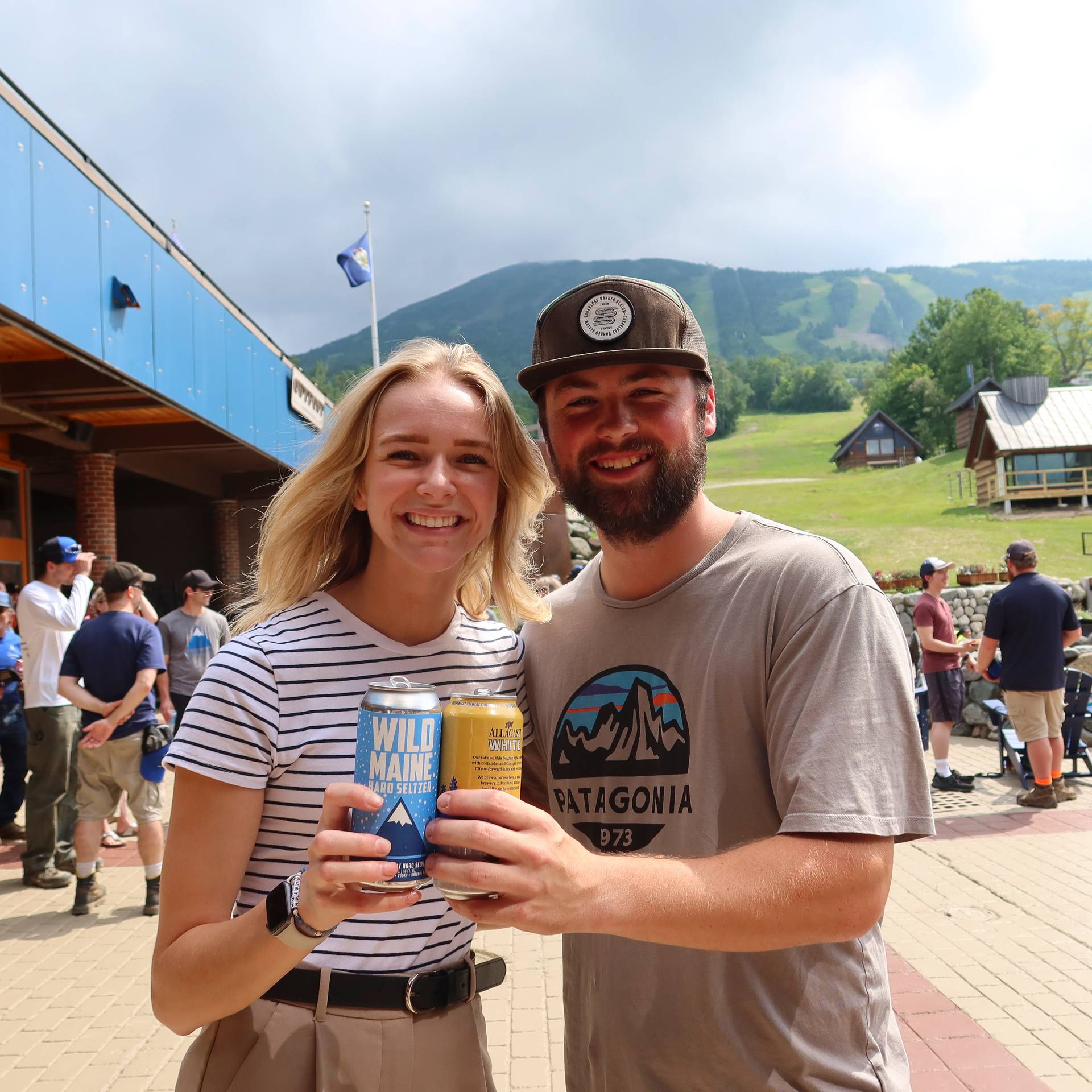 Couple smiling with beer