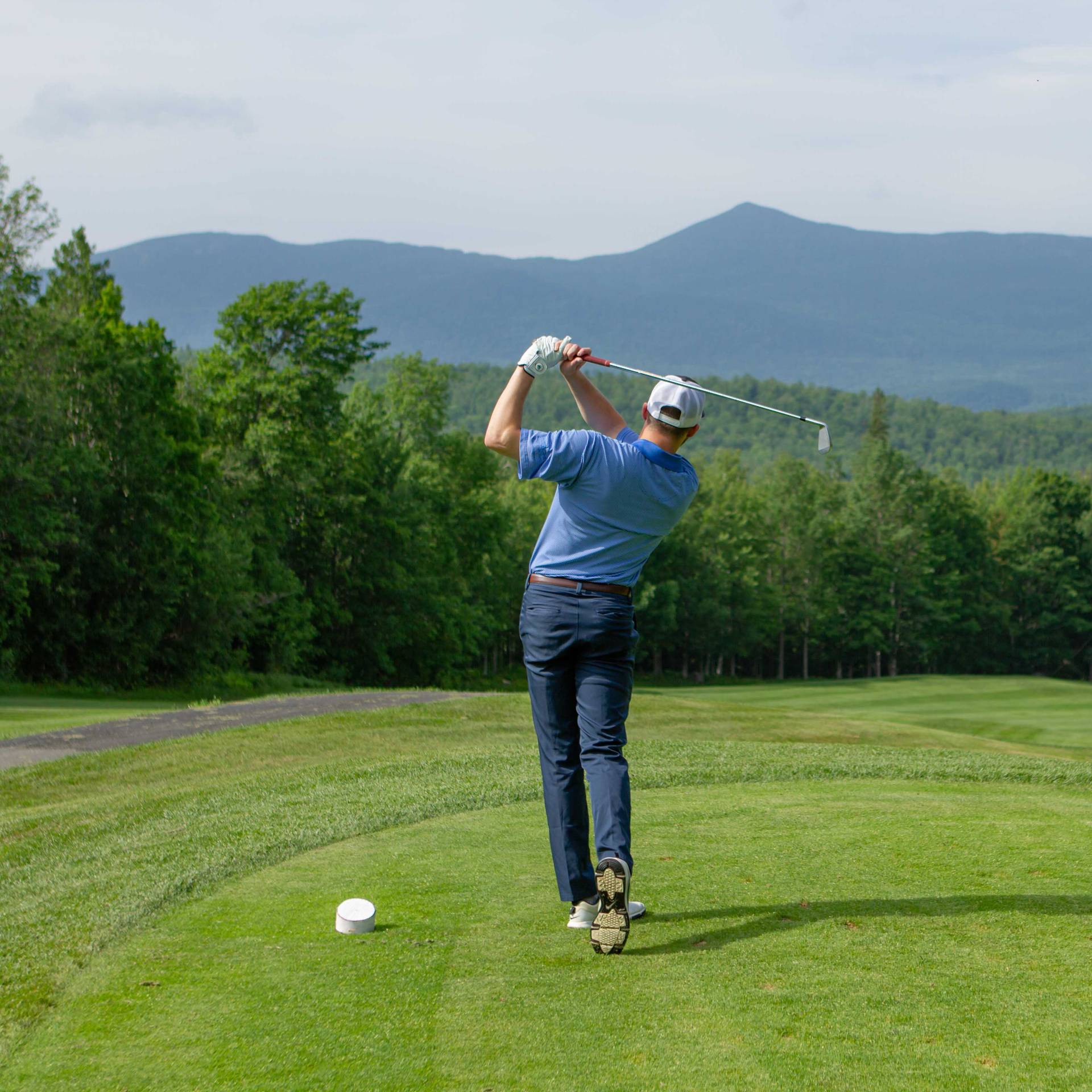 Dad executing the perfect golf swing