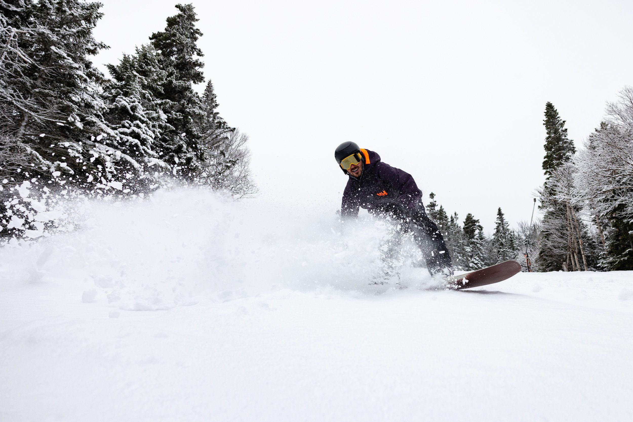 Snowboarder in powder