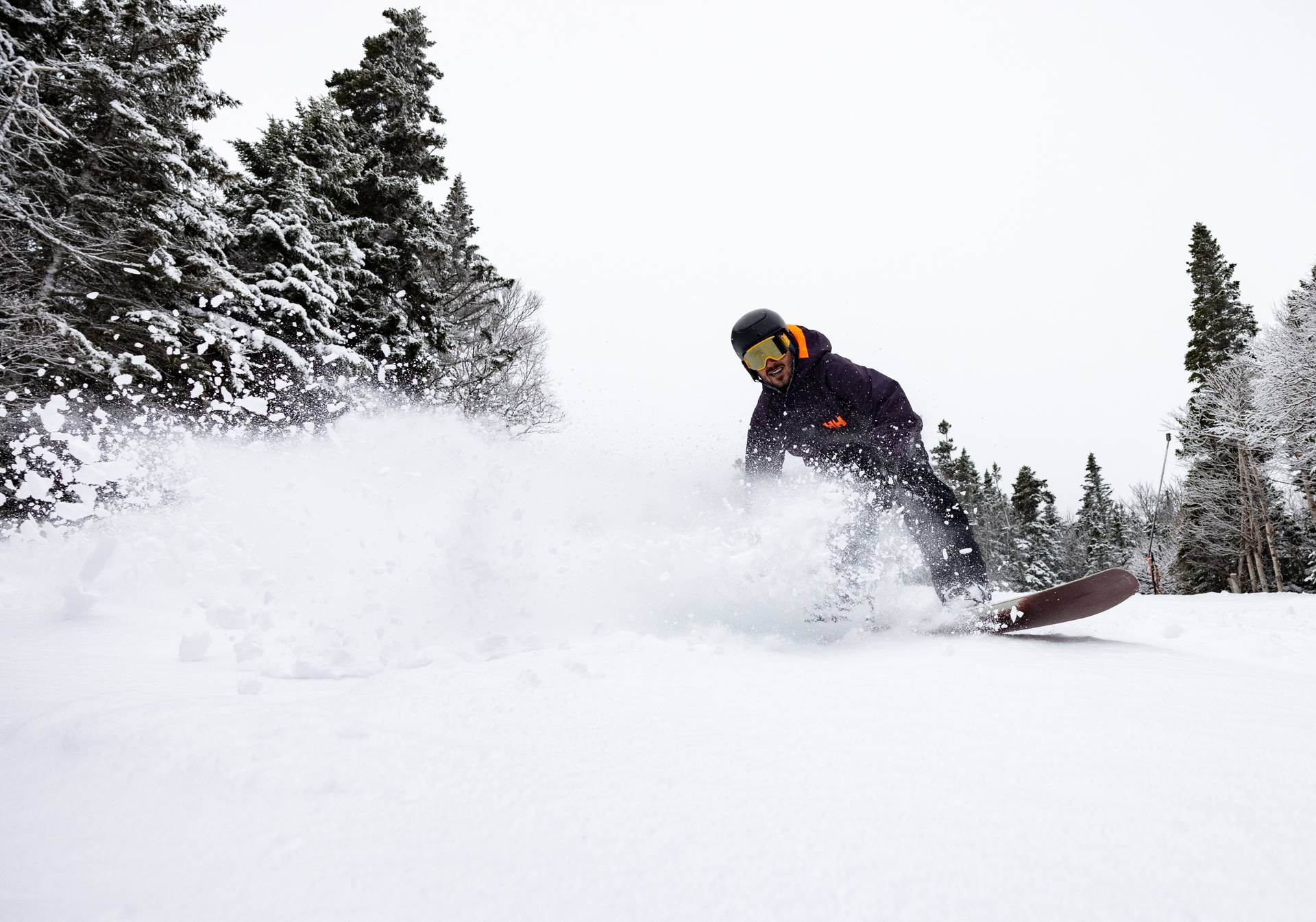 Snowboarder in powder