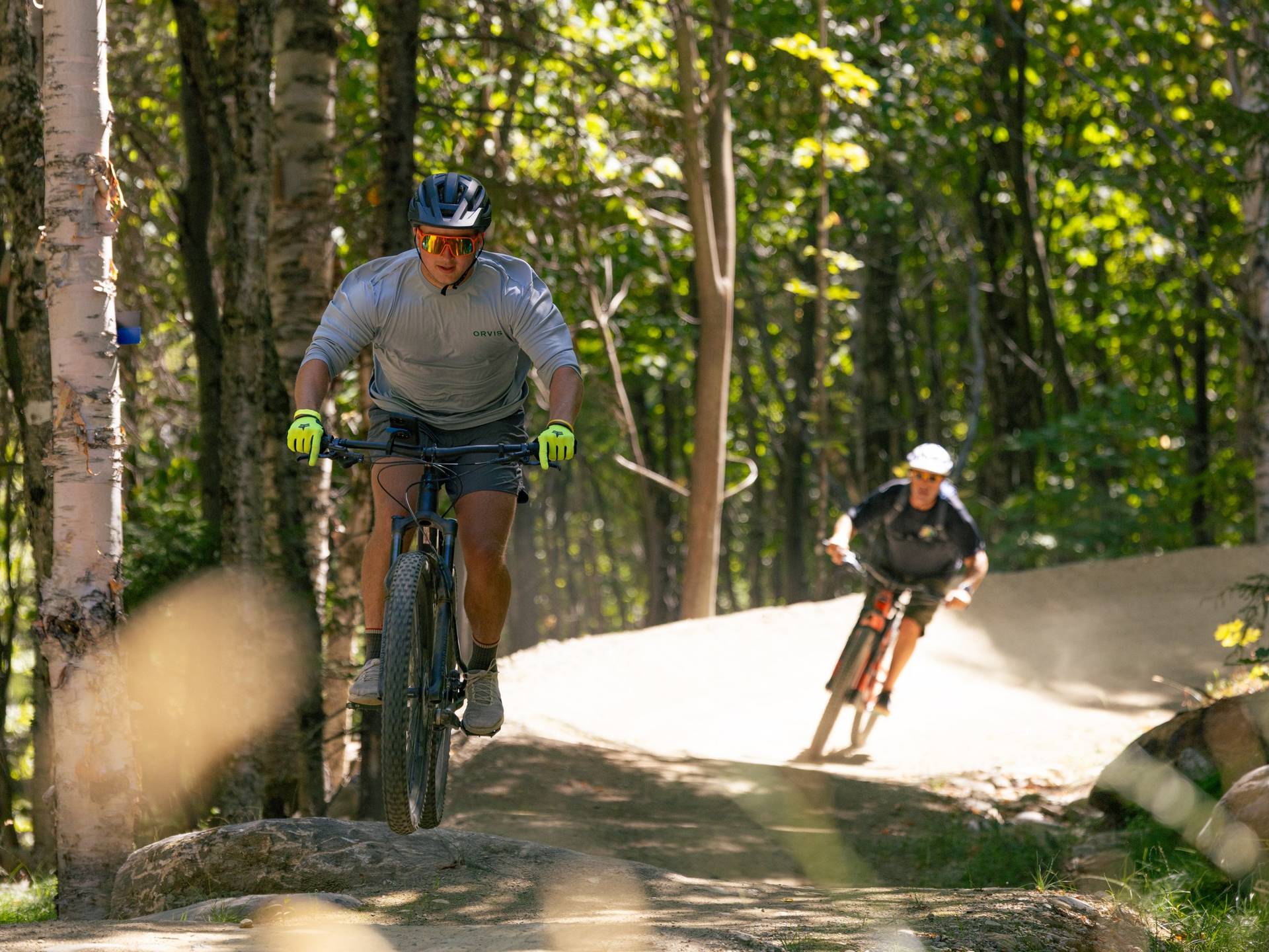 Two riders on trail