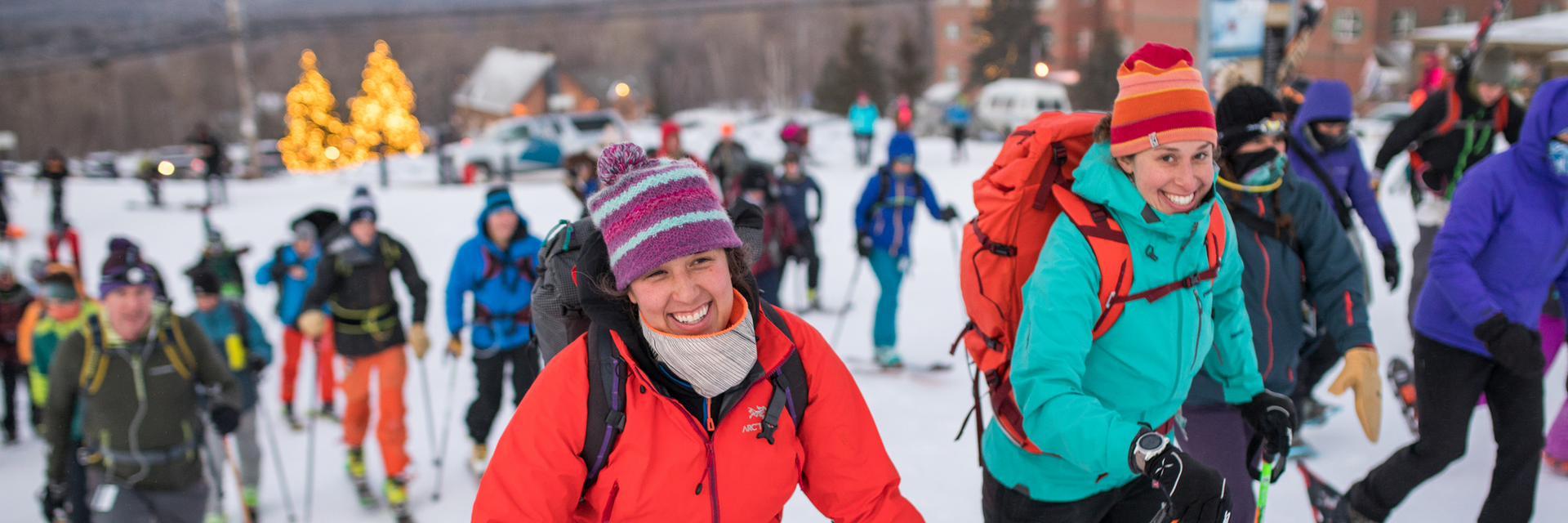 uphill skiers smiling