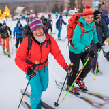 uphill skiers smiling