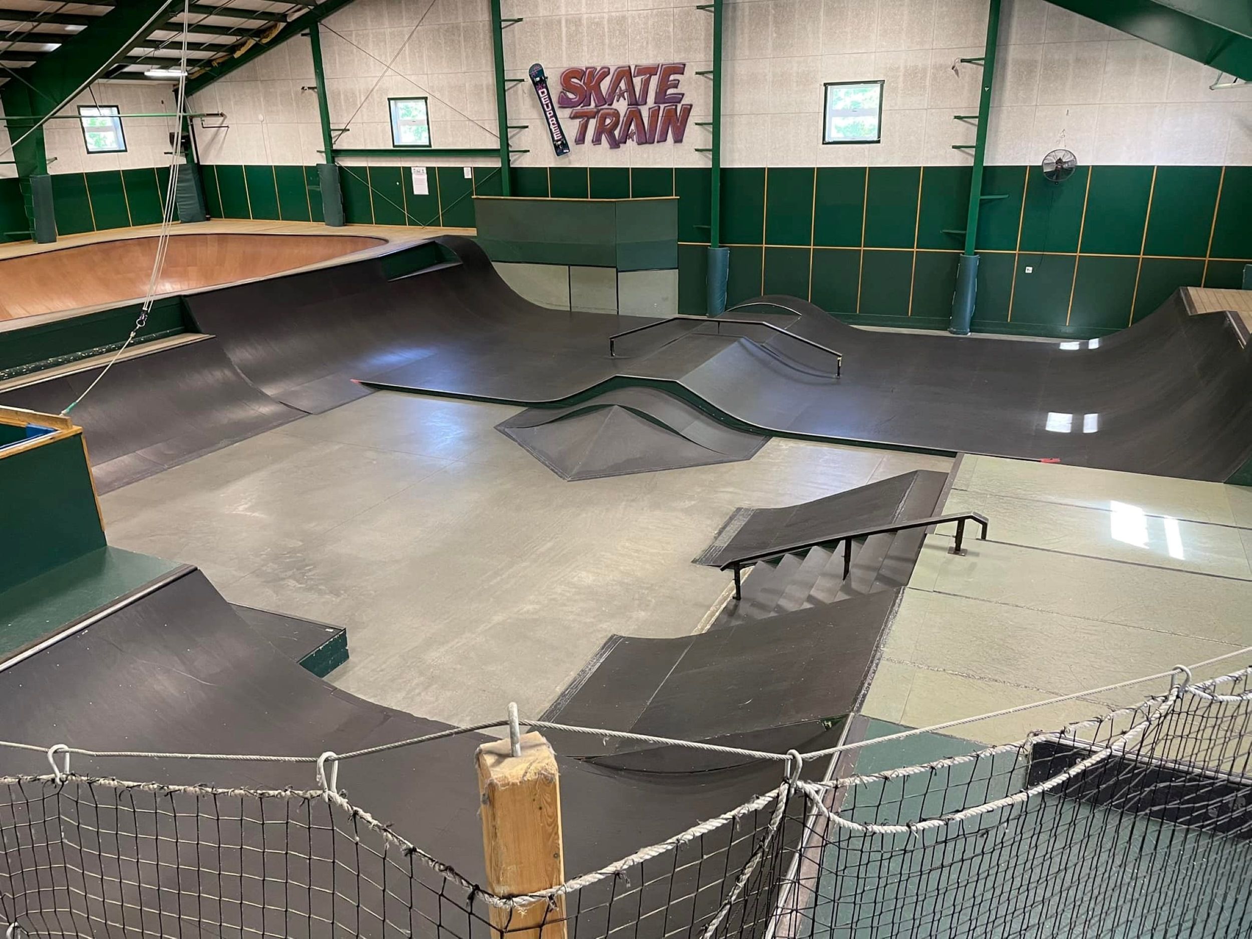 Skate park area complete with ramps, rails, and potential 