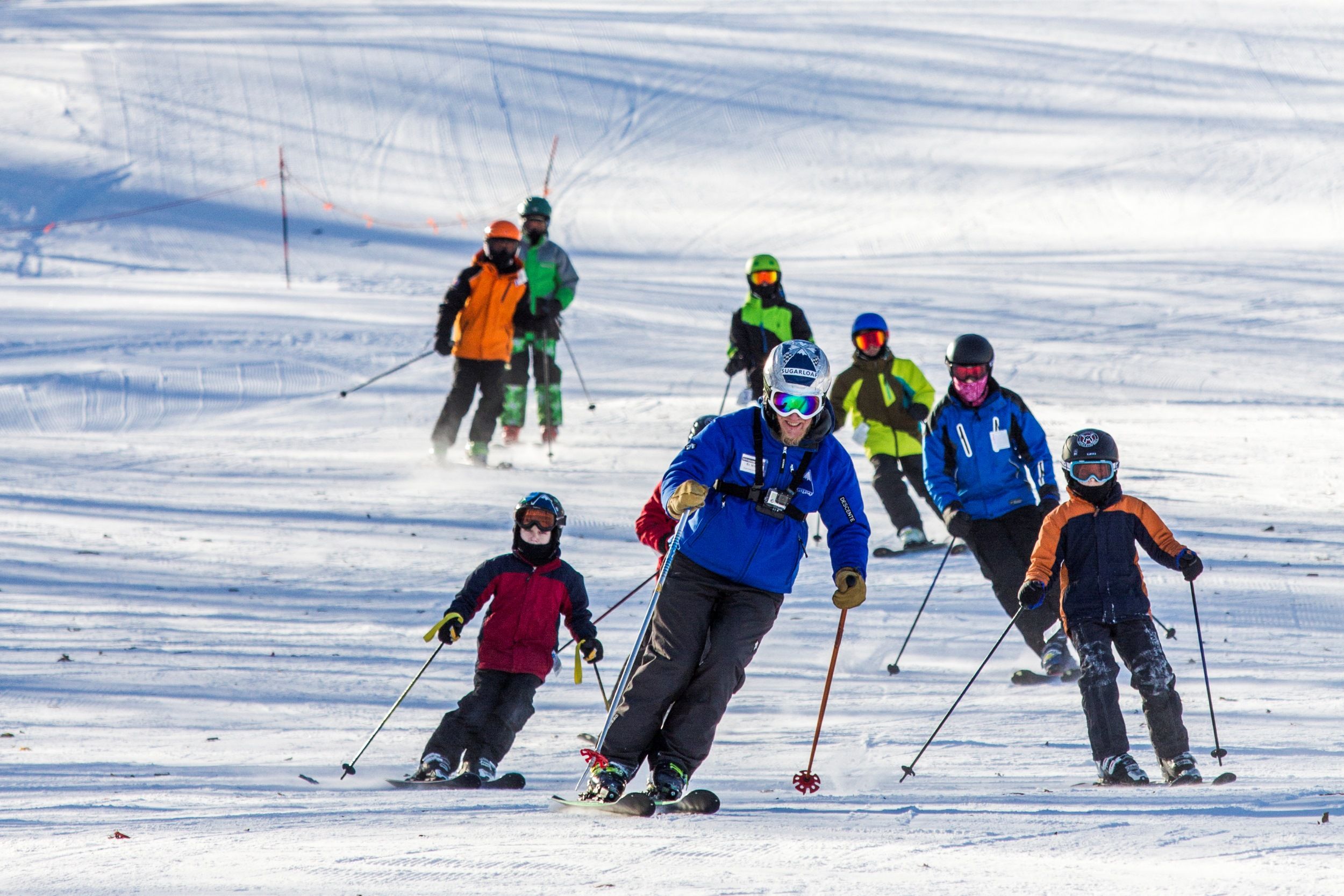 skiers following an instructor