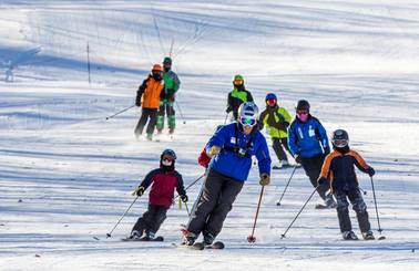 skiers following an instructor