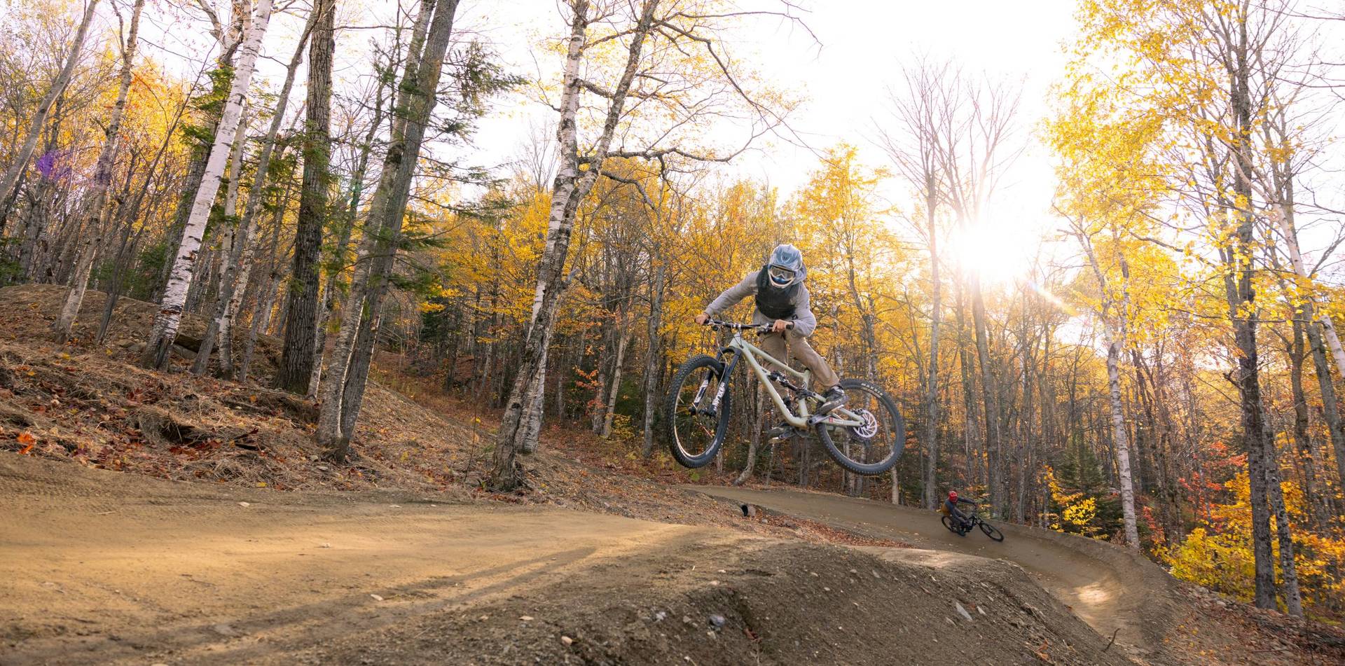 Young biker on berm