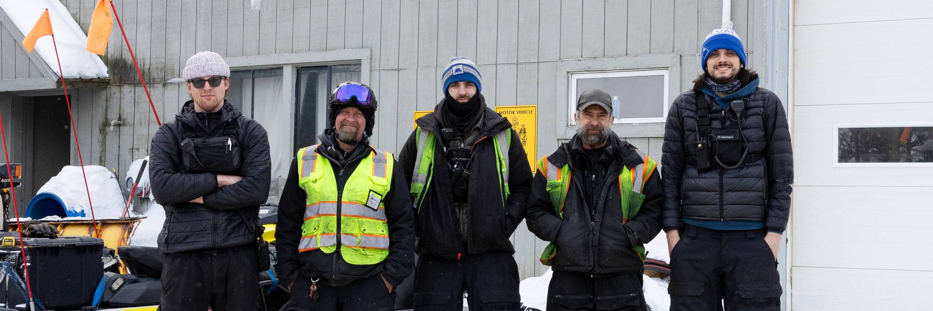 Snowmakers standing together