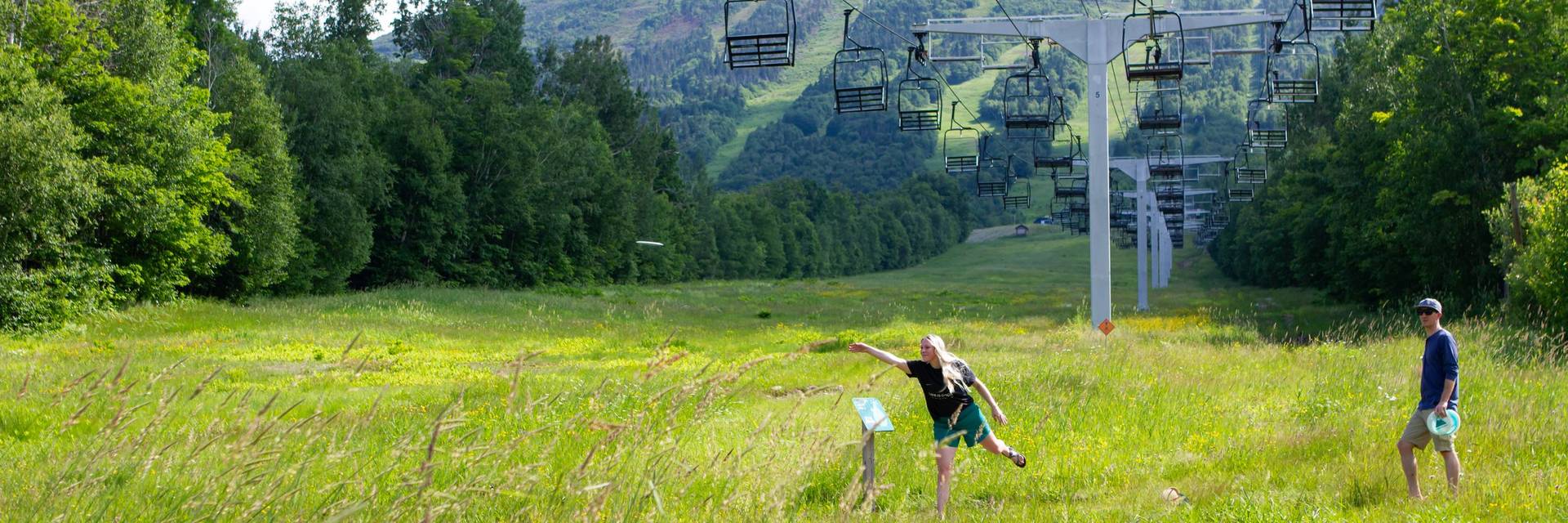 Two disc golf players