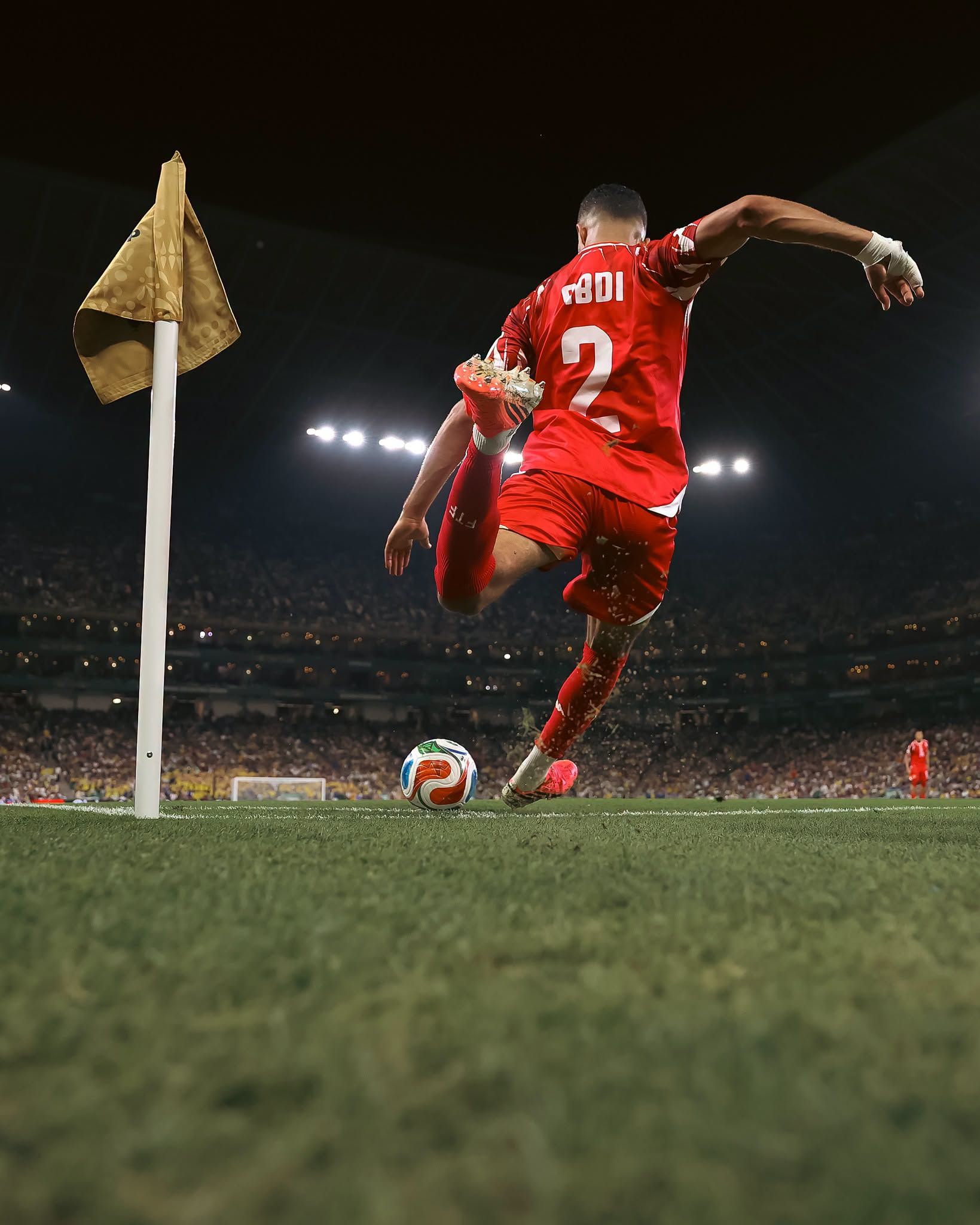 Soccer player kicking ball