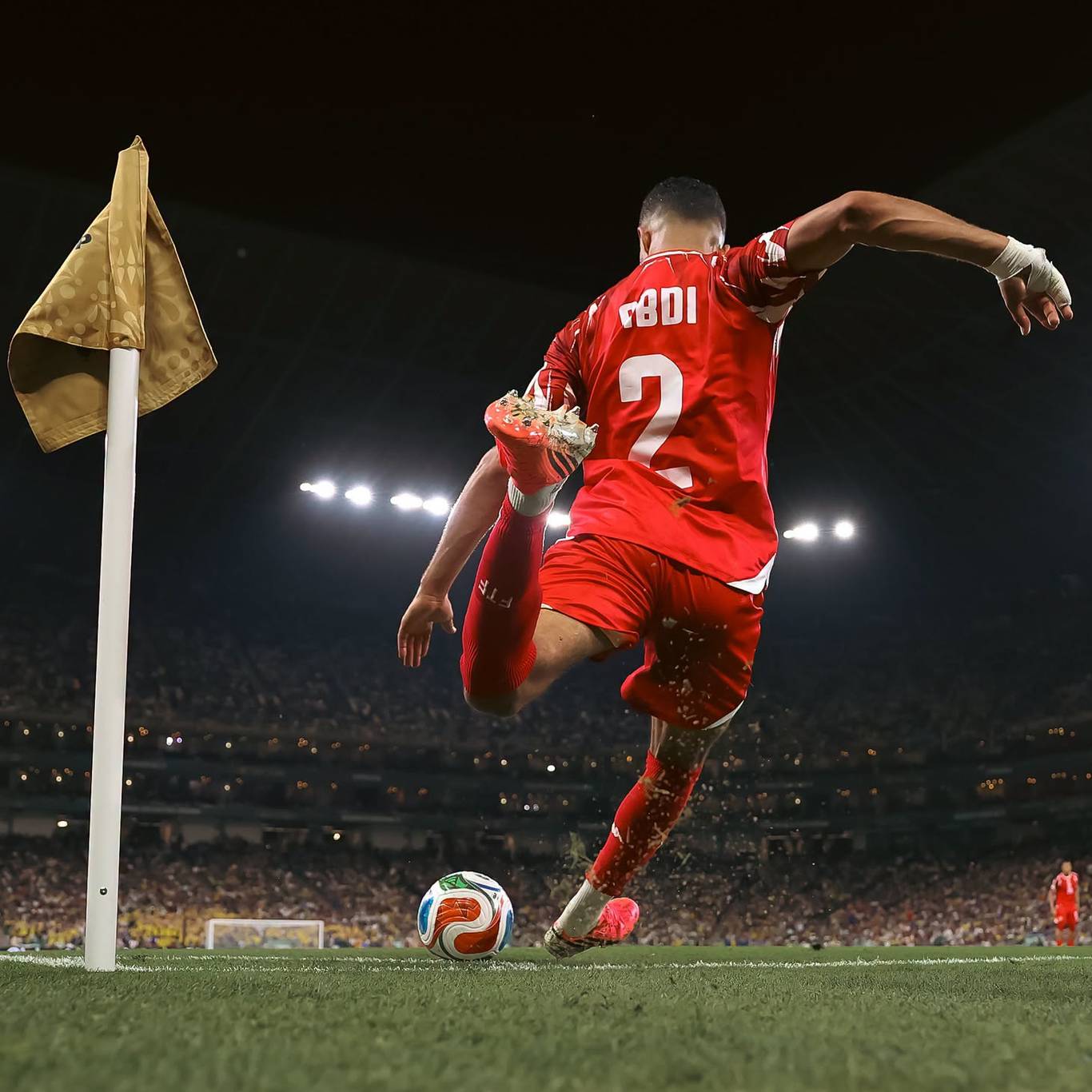 Soccer player kicking ball