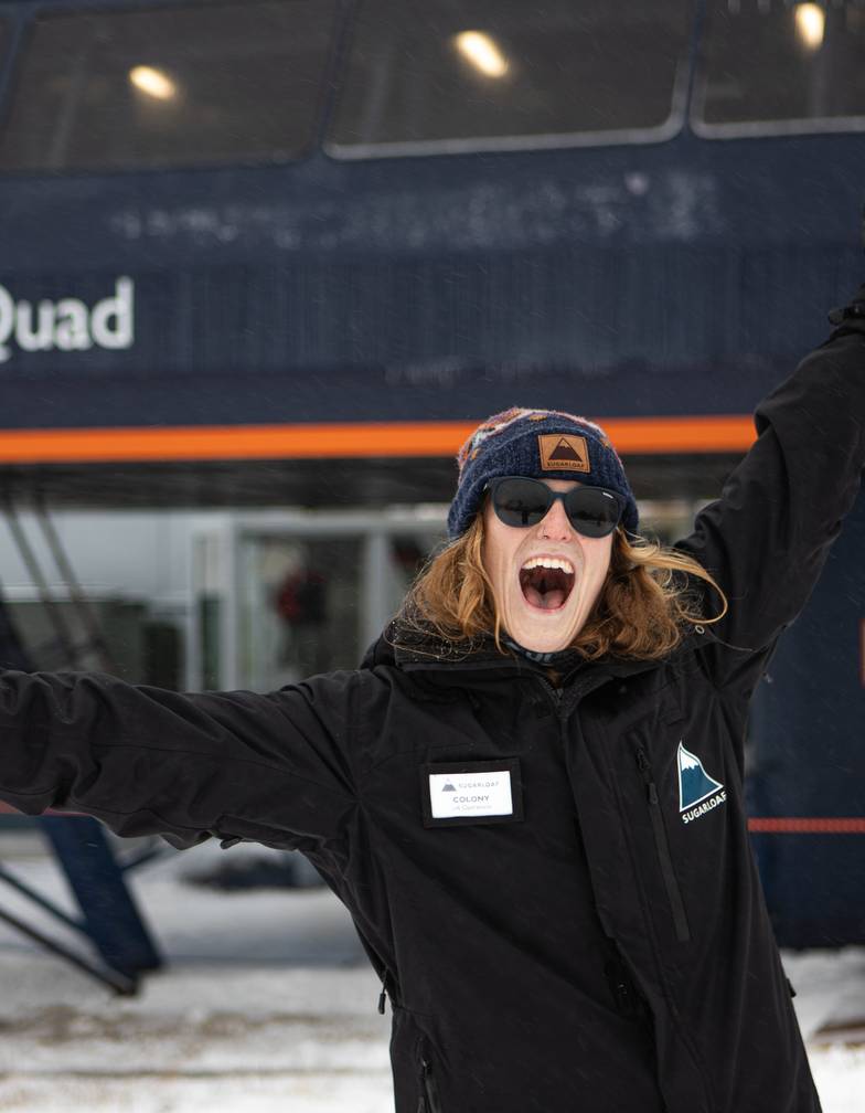 Smiling sugarloaf employee
