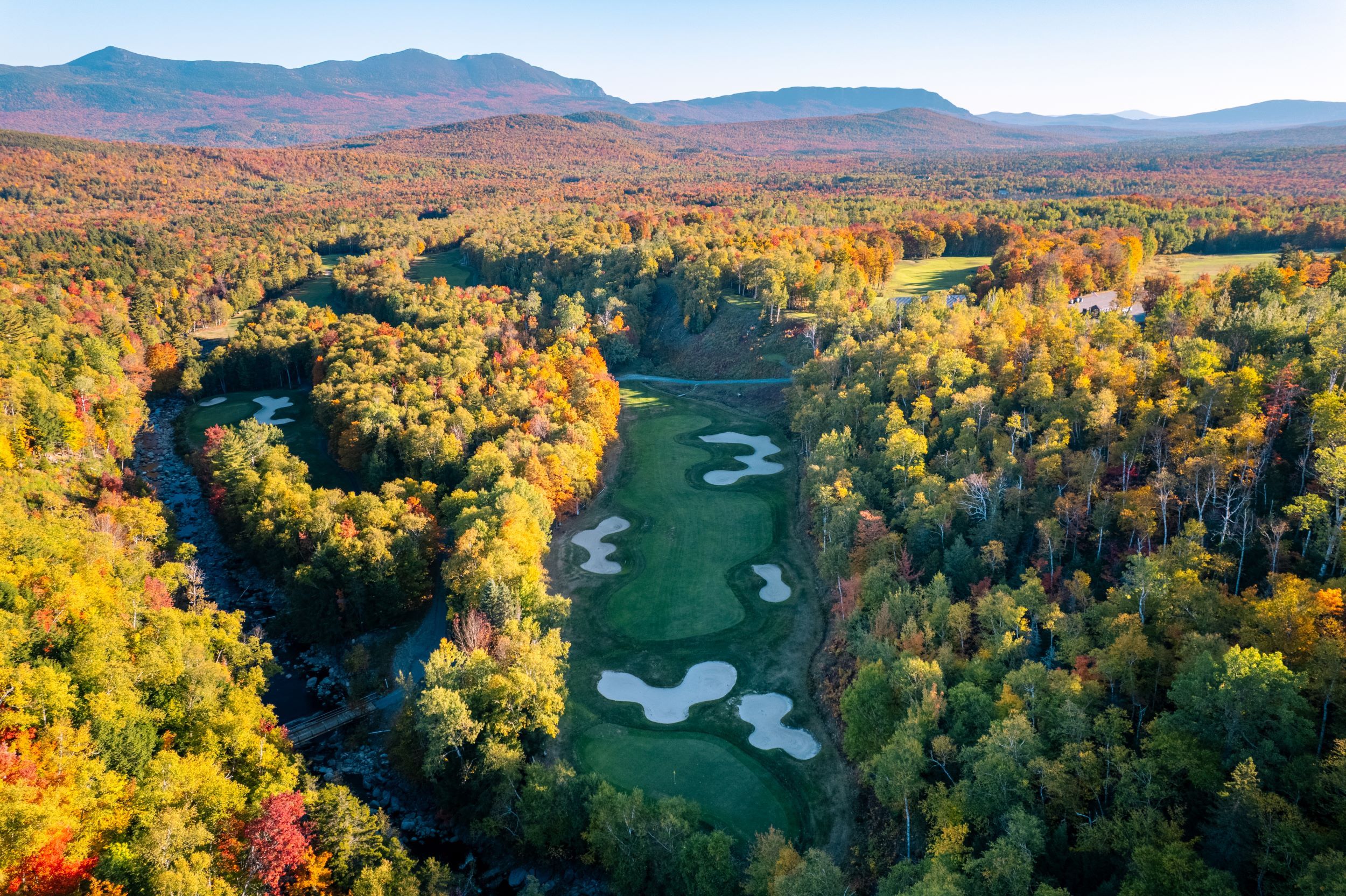 Fall foliage over sugarloaf golf course