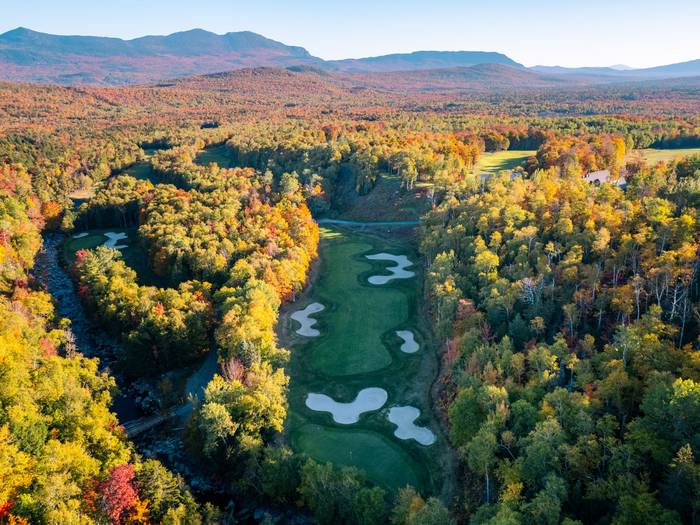 Fall foliage over sugarloaf golf course