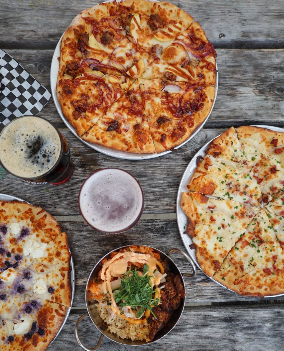 Brickyard Brewing Co. pizza variety with beers 
