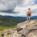 Man standing at Summit of Burnt Mountain