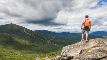 Woman looking at the view of mountains