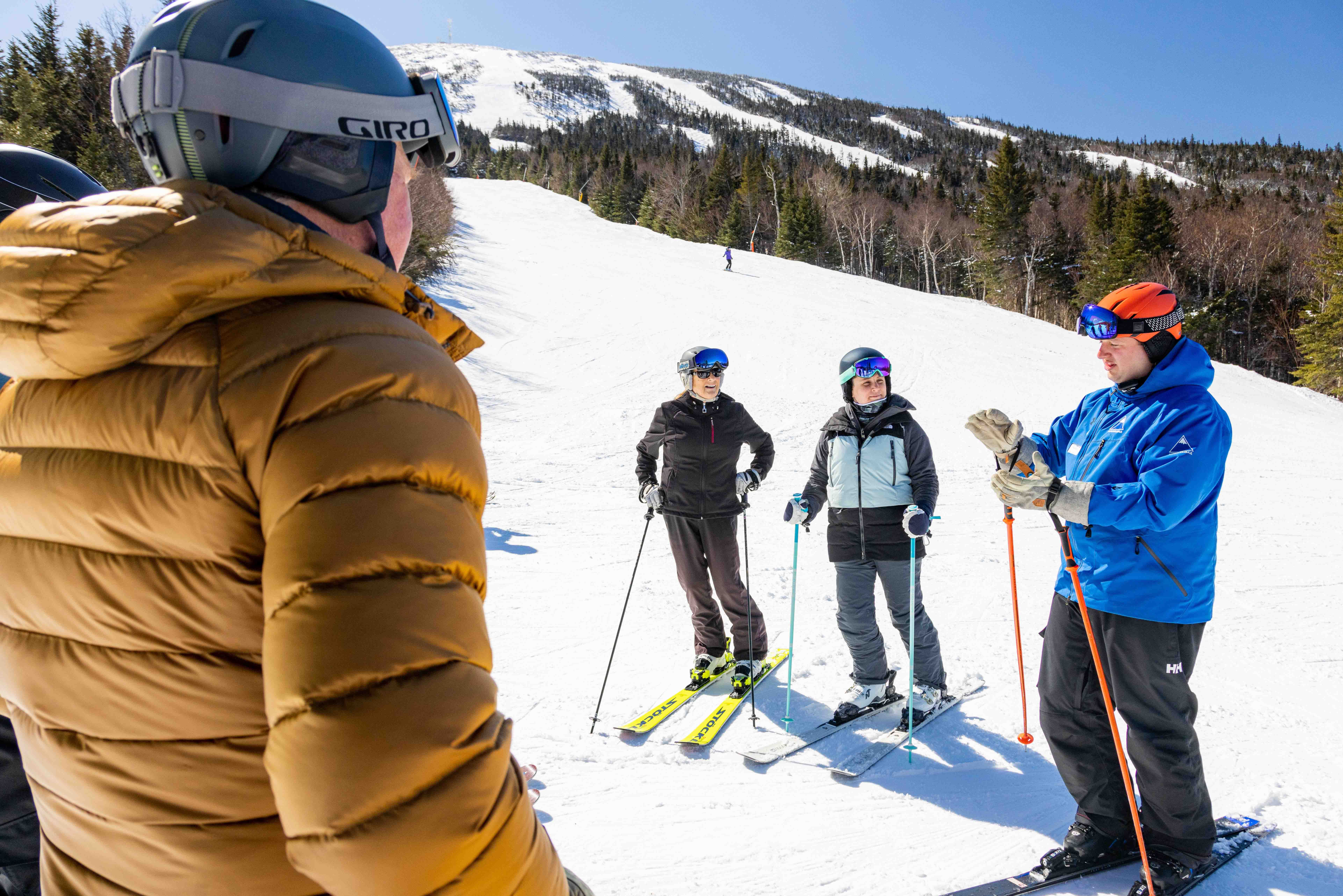 Ski instructor giving lesson