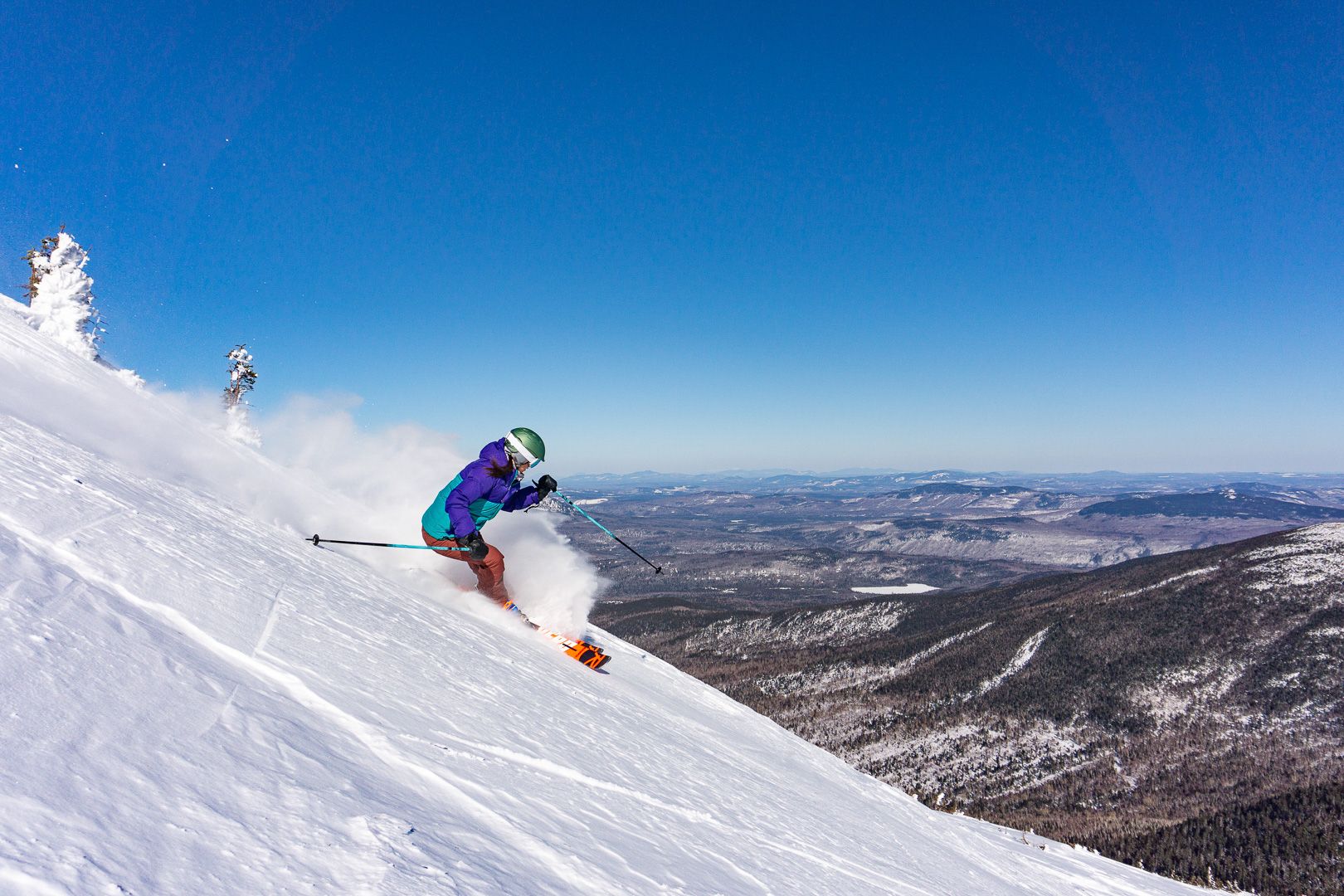 Female skier in snowfields