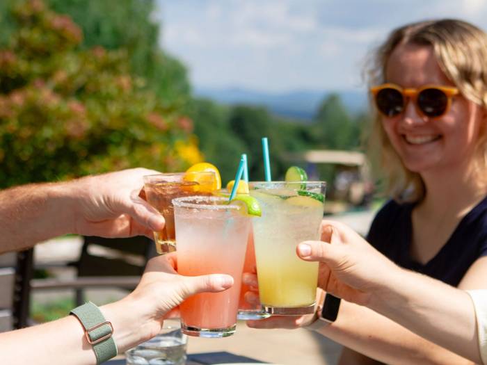 Guests cheers at Strokes Bar and Grille