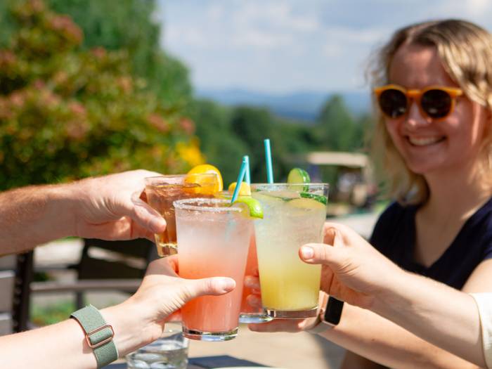 Guests cheers at Strokes Bar and Grille