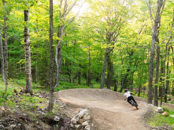 Female biker on berm