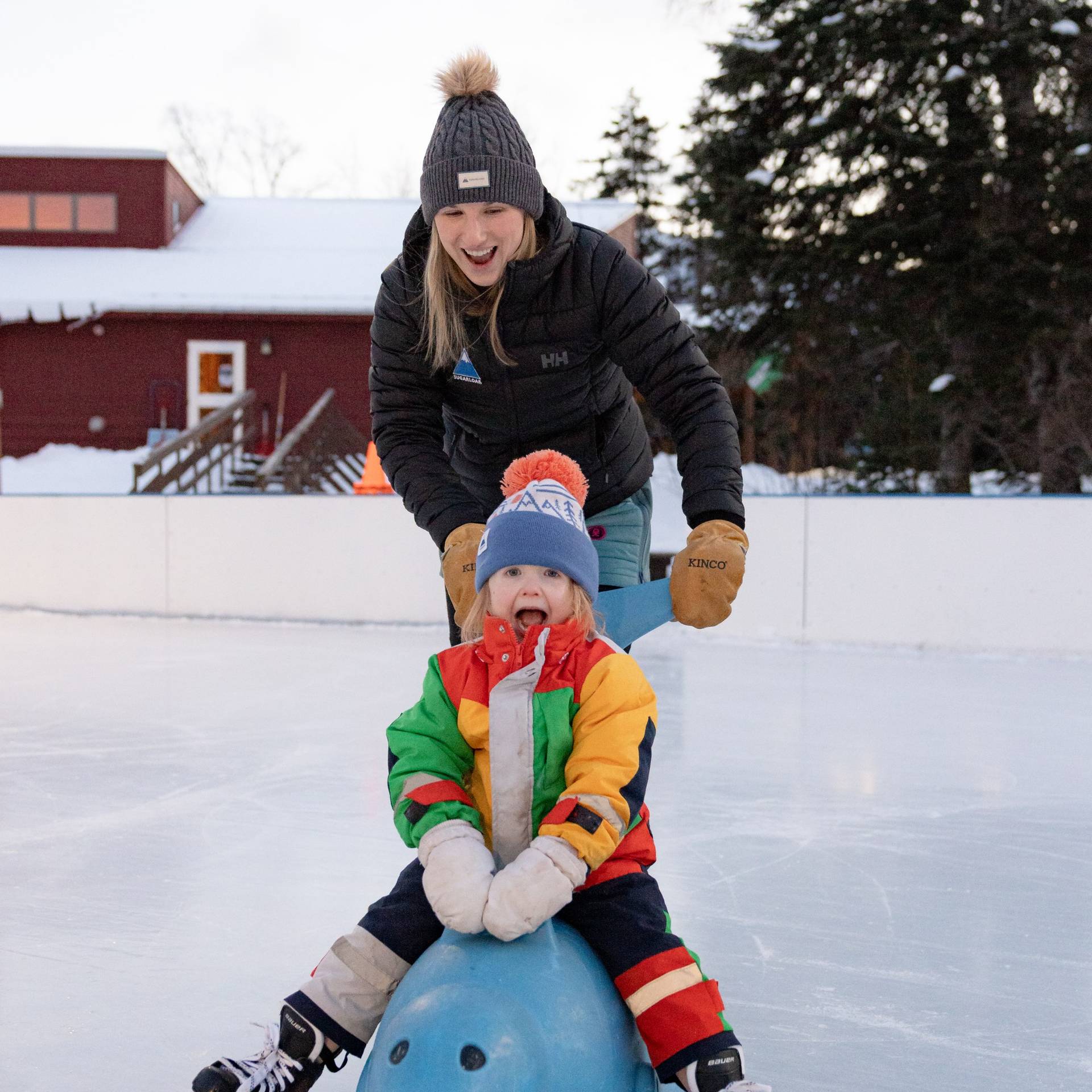Mother and daughter on ice