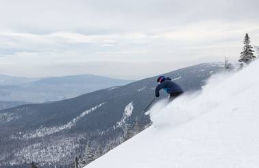 skier on steep terrain