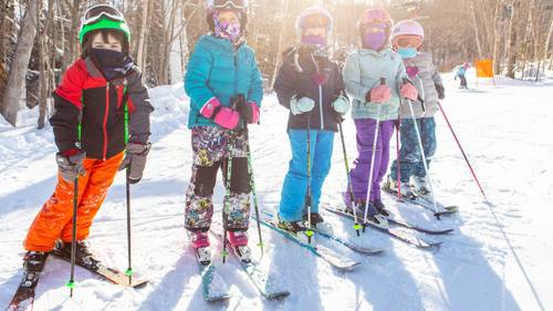 Children on a ski trail