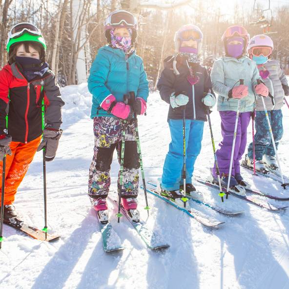 children on skis