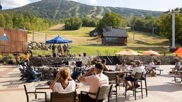 Spectators enjoying live music on the beach