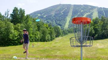 Person throwing frisbee
