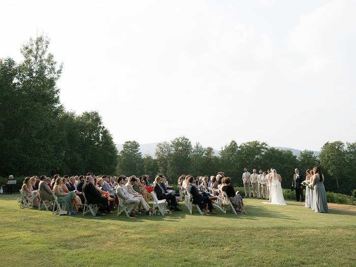 Bride and groom with wedding attendees