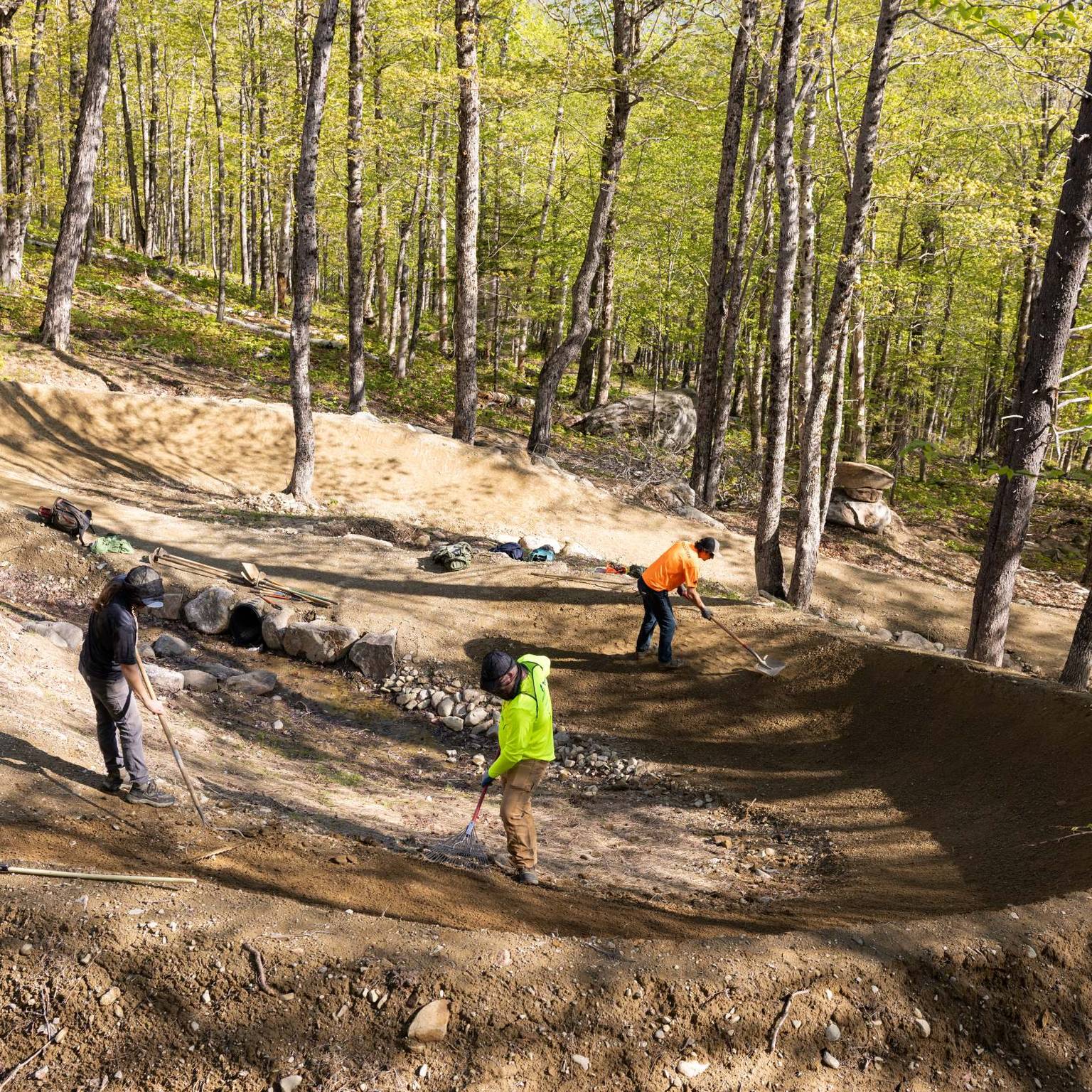 Sugarloaf trail crew building a big, beautiful berm
