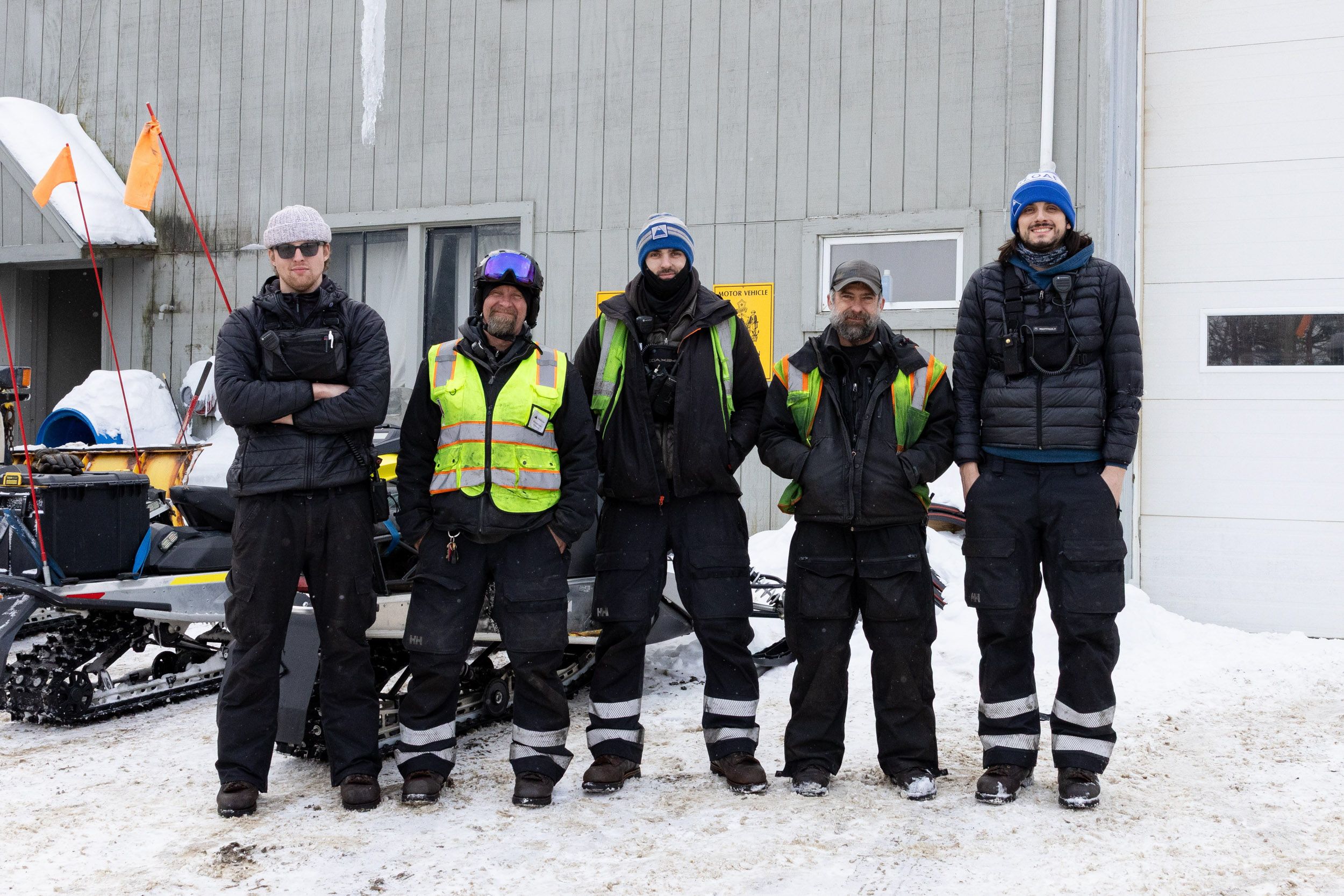 Snowmakers standing together