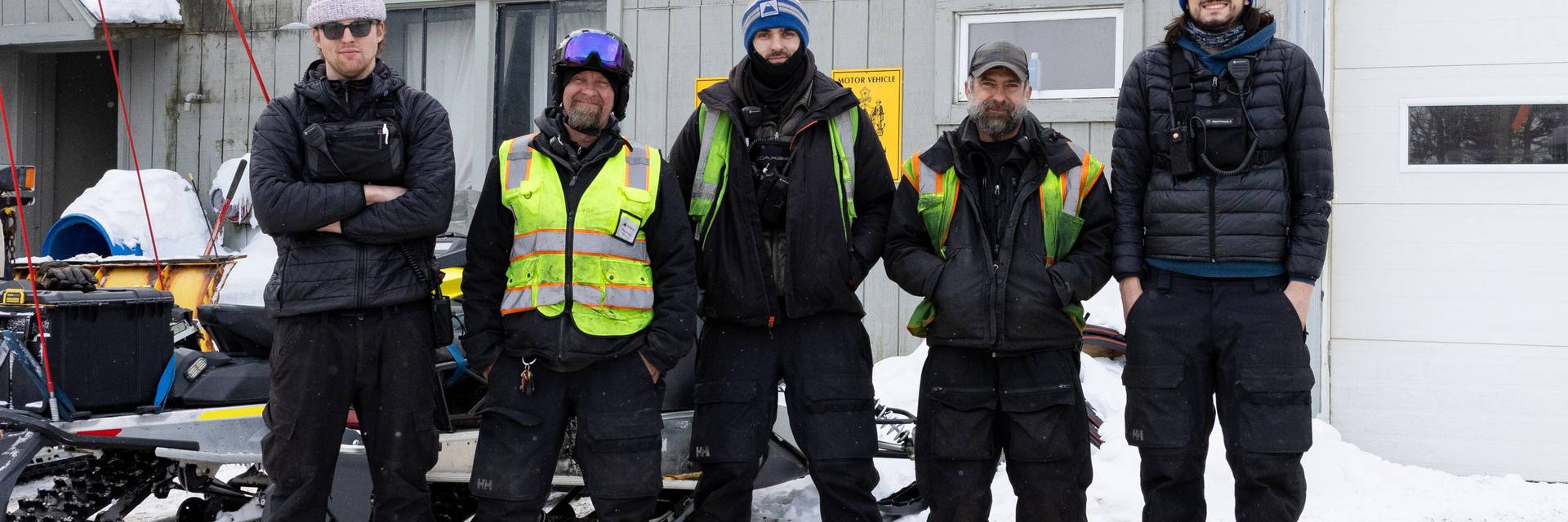 Snowmakers standing together