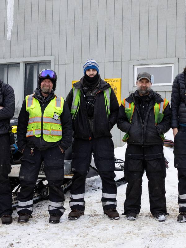 Snowmakers standing together