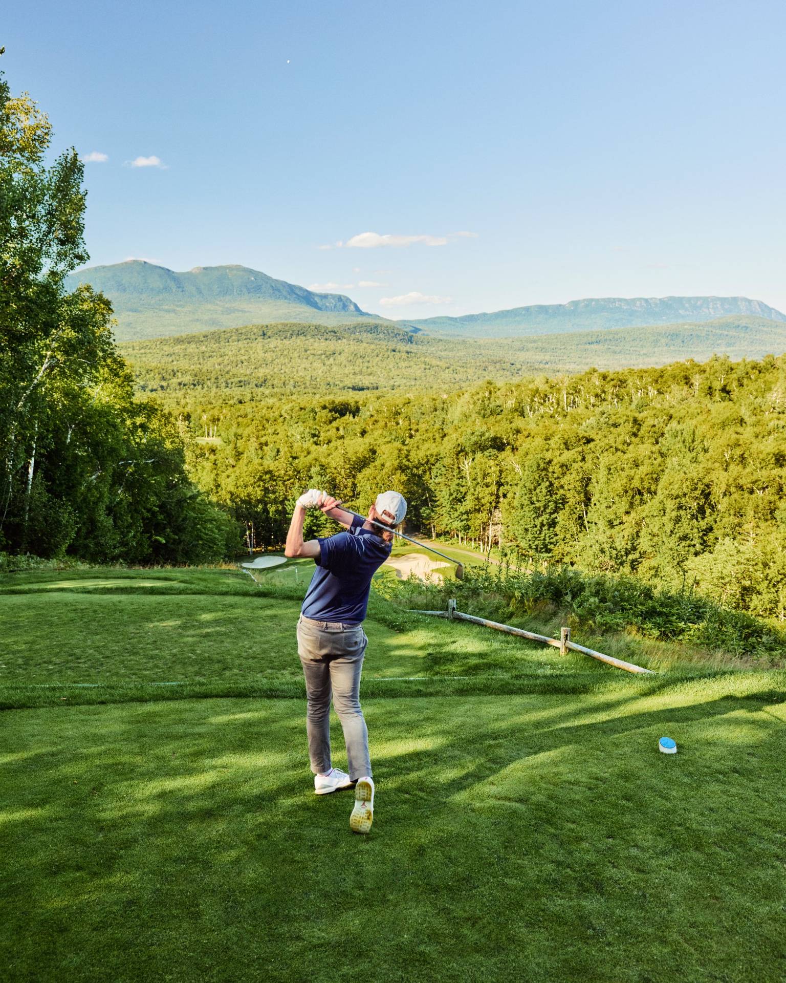 Golfer mid swing