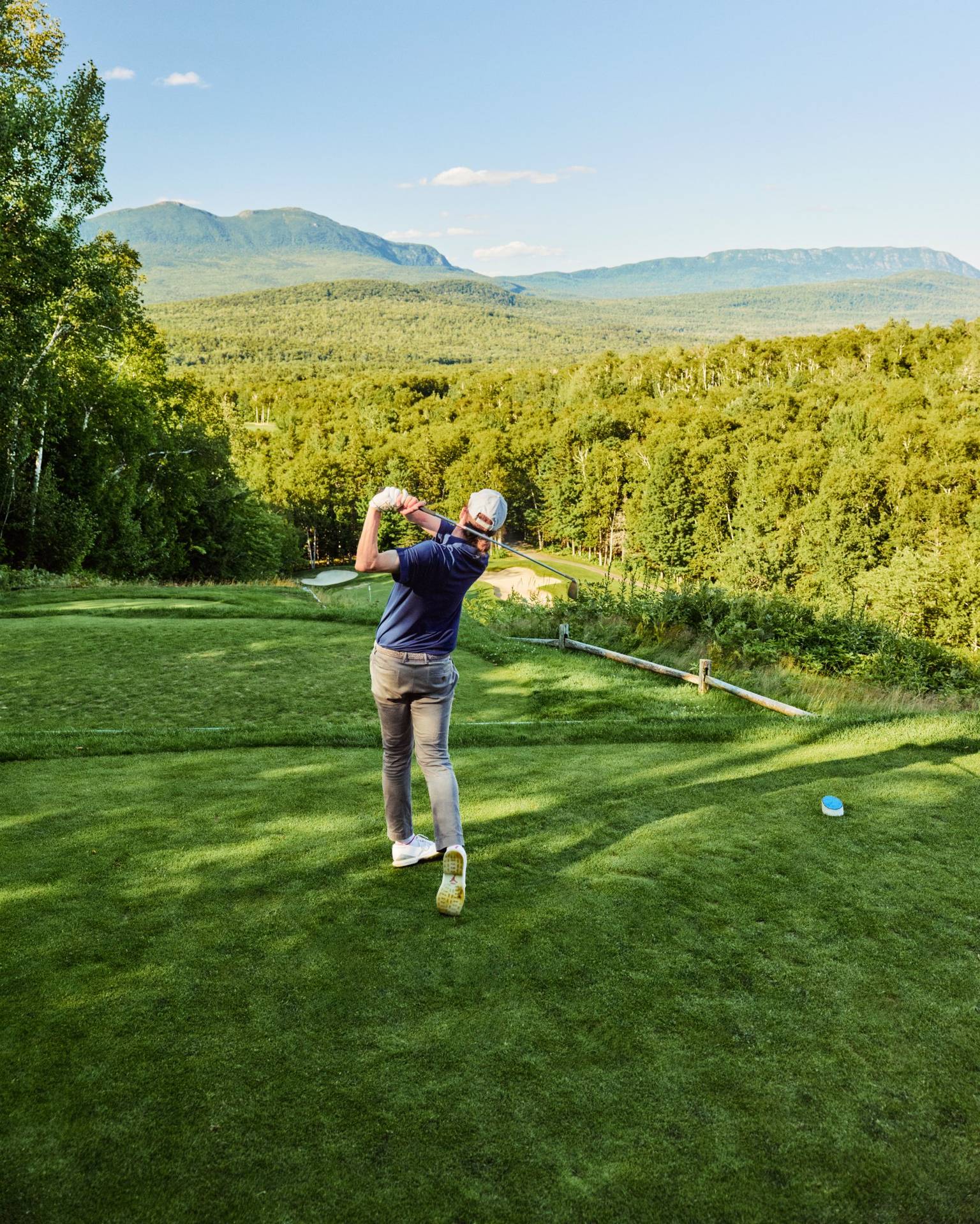 Golfer mid-swing