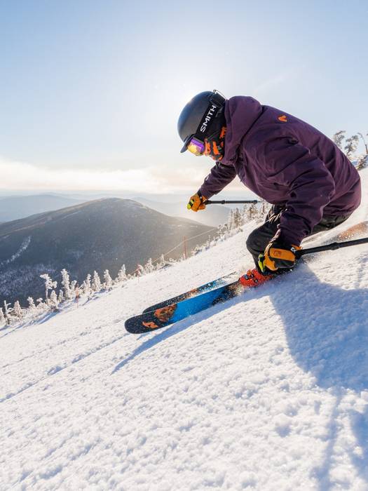 skier on groomer