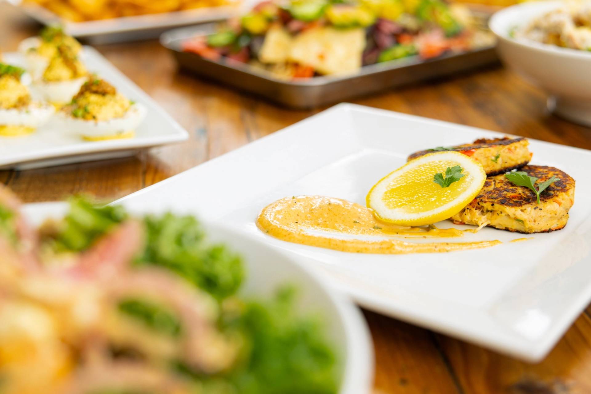 Crab cakes and lemon at Strokes Bar & Grille