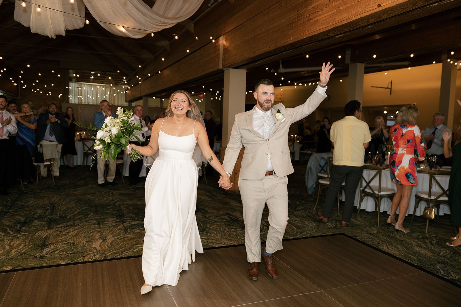 Bride and groom entering the floor